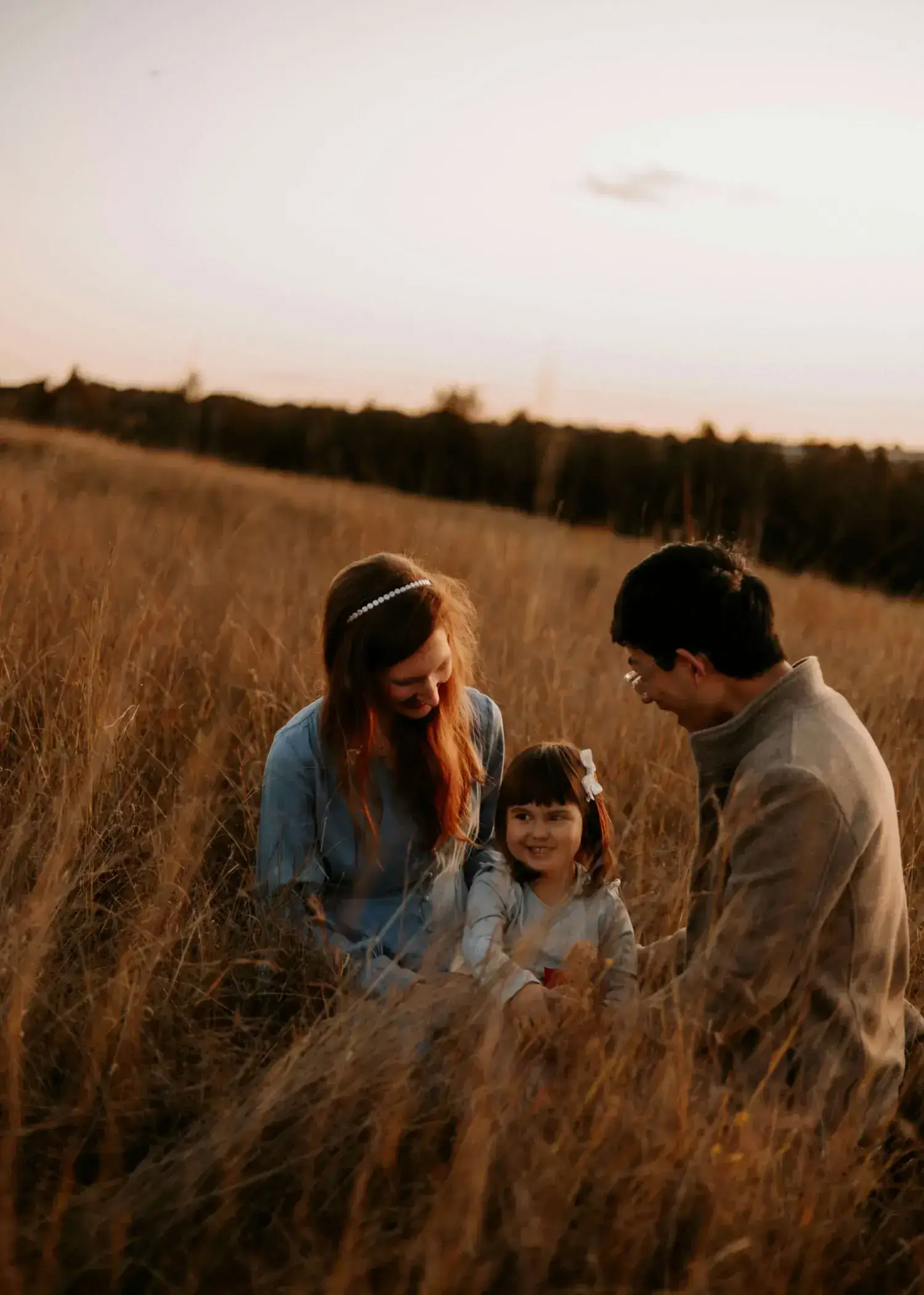 A couple in a sunlit field